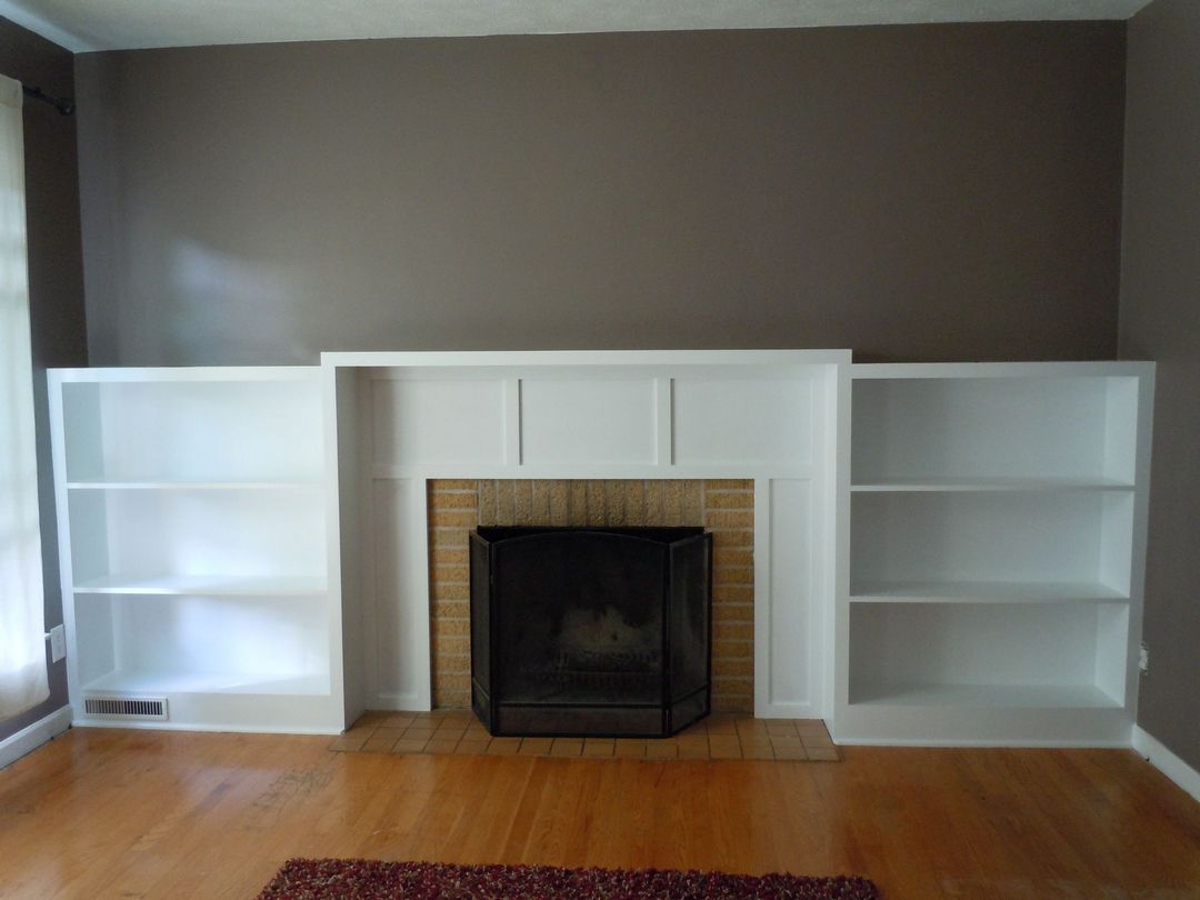 Built-in bookcases and mantel.